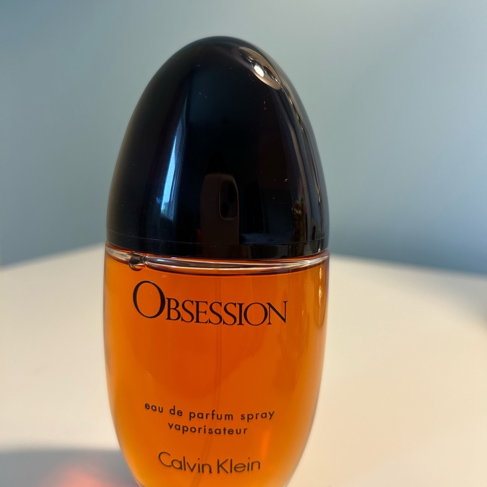 Calvin Klein Obsession Perfume in Black and Orange